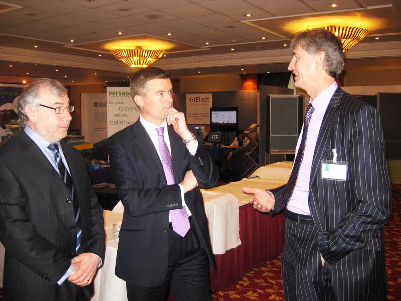Shaw's Managing Director, Crispin Williams (right) in conversation with Mark Harper MP, Minister for Political and Constitutional Reform (centre), and John Turner, Chief Executive AEA (left).